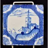 An 18th century Liverpool Delft tile painted in underglaze blue with coastal landscape within
