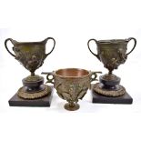 AFTER THE ANTIQUE; a bronze Roman inspired twin handled cup 'skyphos' modelled with ivy leaves and