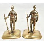 A pair of brass model soldiers modelled as Boer War officers on octagonal bases, unmarked, height