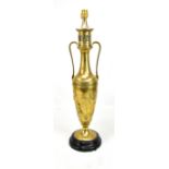 A late 19th/early 20th century bronze table lamp modelled in the form of a Grecian urn, relief