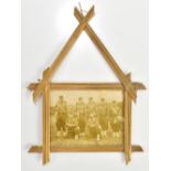 A French WWI period trench art straw photograph frame, with sepia photograph depicting seven