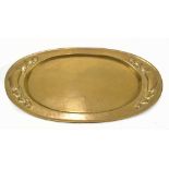 BELDRAY; an Arts and Crafts brass tray of oval form, relief decorated with Voysey-style panels,