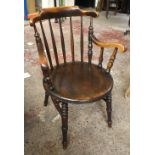 A 19th century elm seated spindle back captain's armchair.Additional InformationChair is solid,