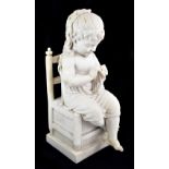 A marble-effect resin figure modelled as a young girl sitting on a chair, impressed 'Biggi Fausto