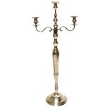 A large silvered metal triple sconce candelabrum on reeded circular base, 100 x 43cm.Additional