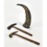 Two hammers with horn terminals raised on tapering wooden handles, length of largest example 30cm,