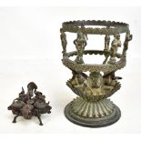 A late 19th/early 20th century Indian cast metal brazier/burner with supports modelled as Hindu