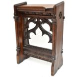 A Victorian carved oak Gothic Revival lectern with carved foliate detail, height 83cm, width