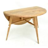 ERCOL; a light elm drop leaf coffee table, raised on column support, height 40cm, length 60cm.