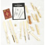 A collection of ivory and bone Stanhope viewers to include examples modelled in the form of page