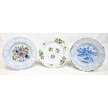 Three 18th century Bristol Delft plates, two with floral decoration and one with chinoiserie-type