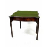 A 19th century mahogany card table with serpentine top and baize lined interior,
