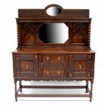 A late 19th/early 20th century oak mirror back sideboard,
