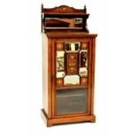 An Edwardian inlaid rosewood music cabinet, inlaid decoration, mirror back and glazed cupboard door,