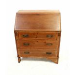 A mahogany cross-banded and ebony-strung bureau,