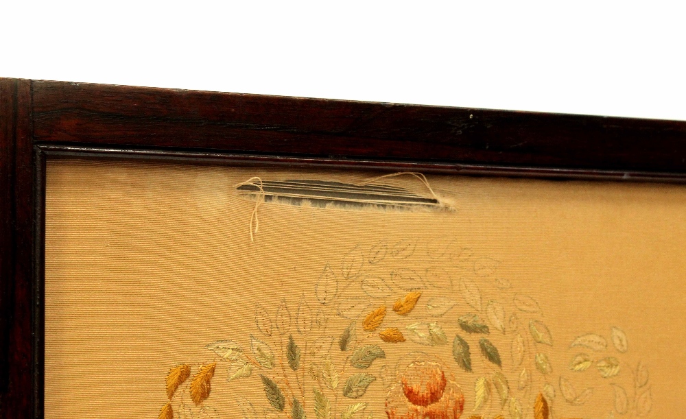 An Edwardian rosewood three-fold screen inlaid with needlework panels depicting flora and fauna, - Image 4 of 4