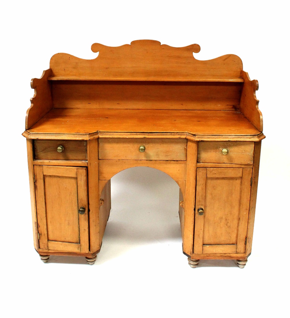 A Victorian pine washstand with gallery and single shelf above a base of three drawers and two