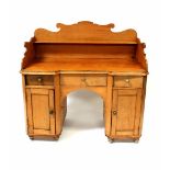 A Victorian pine washstand with gallery and single shelf above a base of three drawers and two