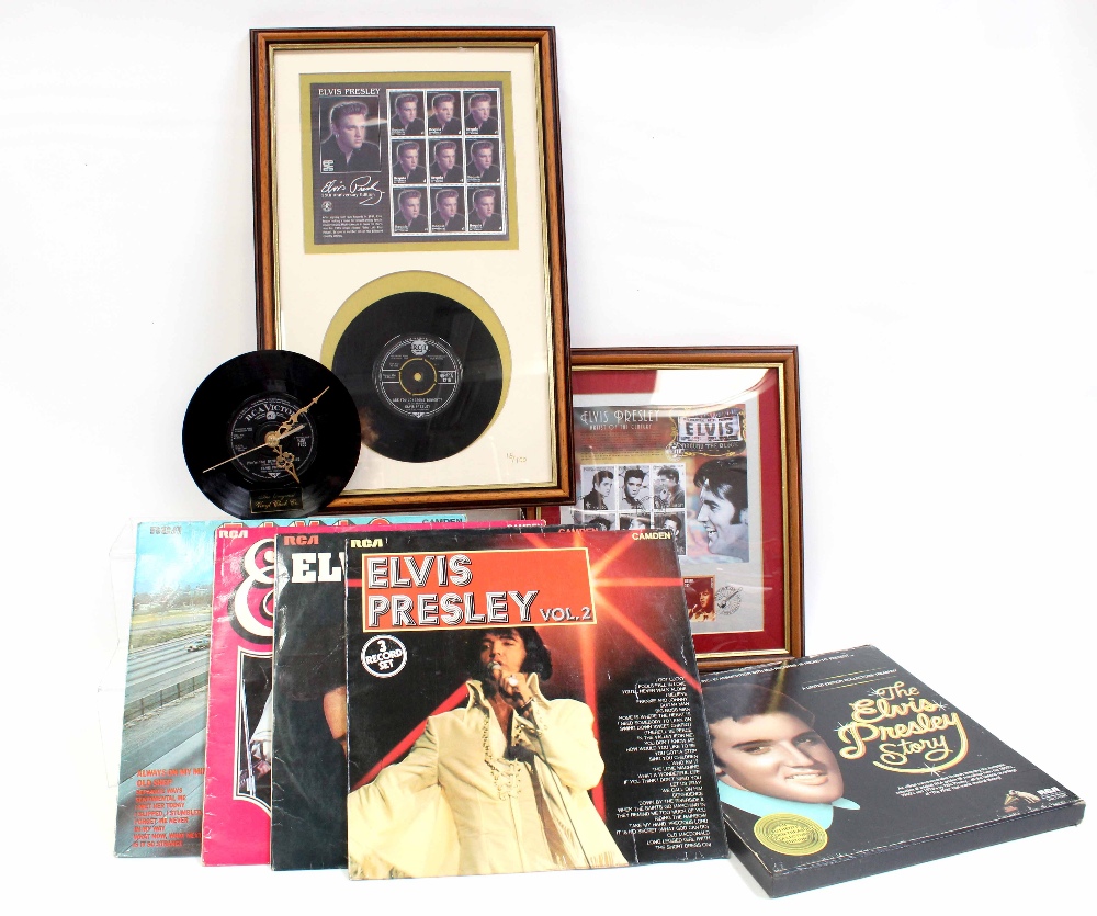 A quantity of Elvis Presley memorabilia to include a wall clock mounted on an Elvis 'Devil in