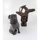 A carved hardwood bust of a bearded gentleman and a terracotta figure of a seated pug (af) (2).