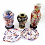 A Japanese Meiji period Imari decorated vase, a Kutani vase, a modern Satsuma vase,