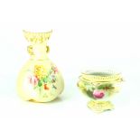 A Royal Worcester blush ware lidded vase of baluster form, painted with gilt highlighted flowers,