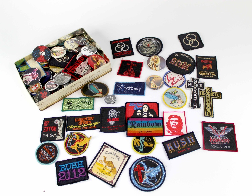 A large quantity of mixed Rock and Pop cloth and metal badges to include Black Sabbath, Status Quo,