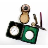 A pocket barometer in silver and leather travel case, the case by Henry Matthews, Birmingham 1904,