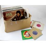 A quantity of vinyl albums and singles to include Shakin' Stevens, ABBA and Paul McCartney.
