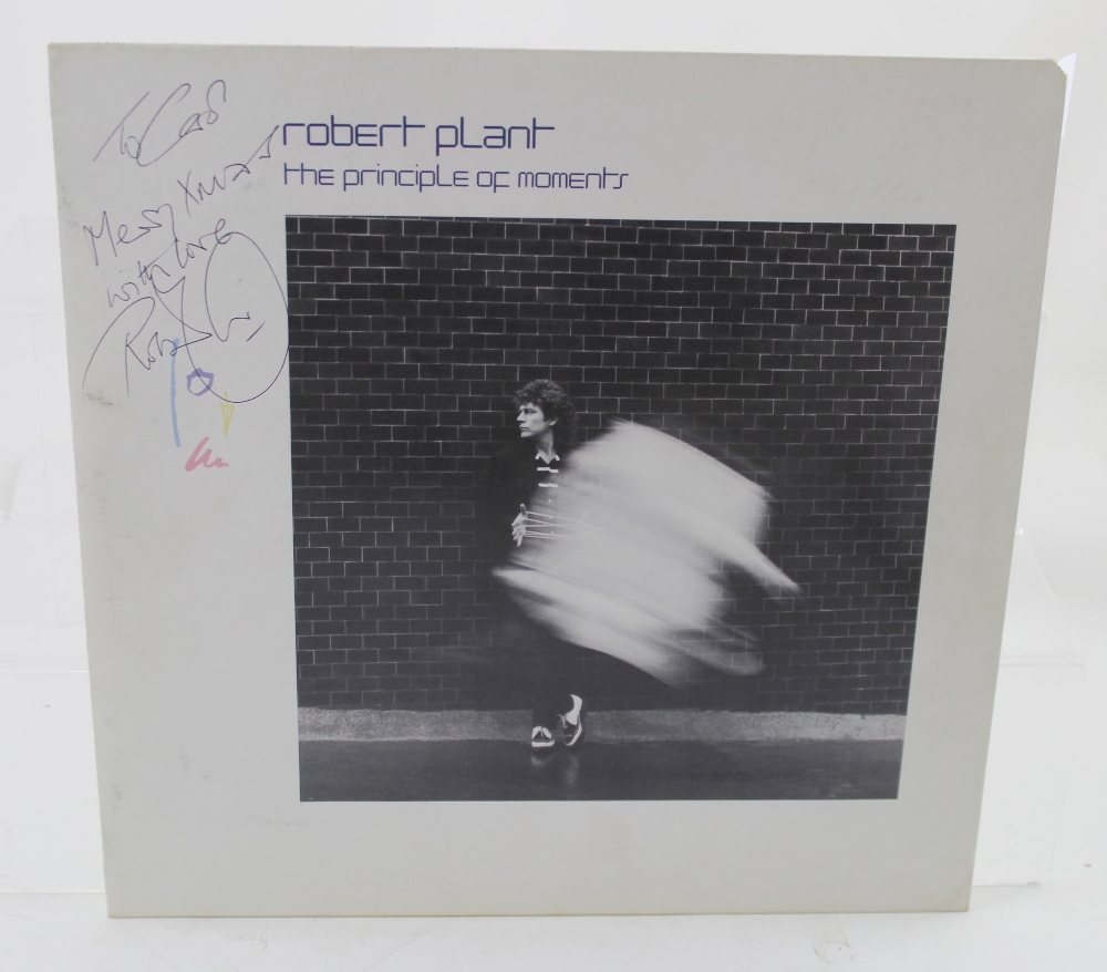 Robert Plant; 'The Principle of Moments', a vinyl LP signed by Robert Plant 'To Carol, Merry Xmas,