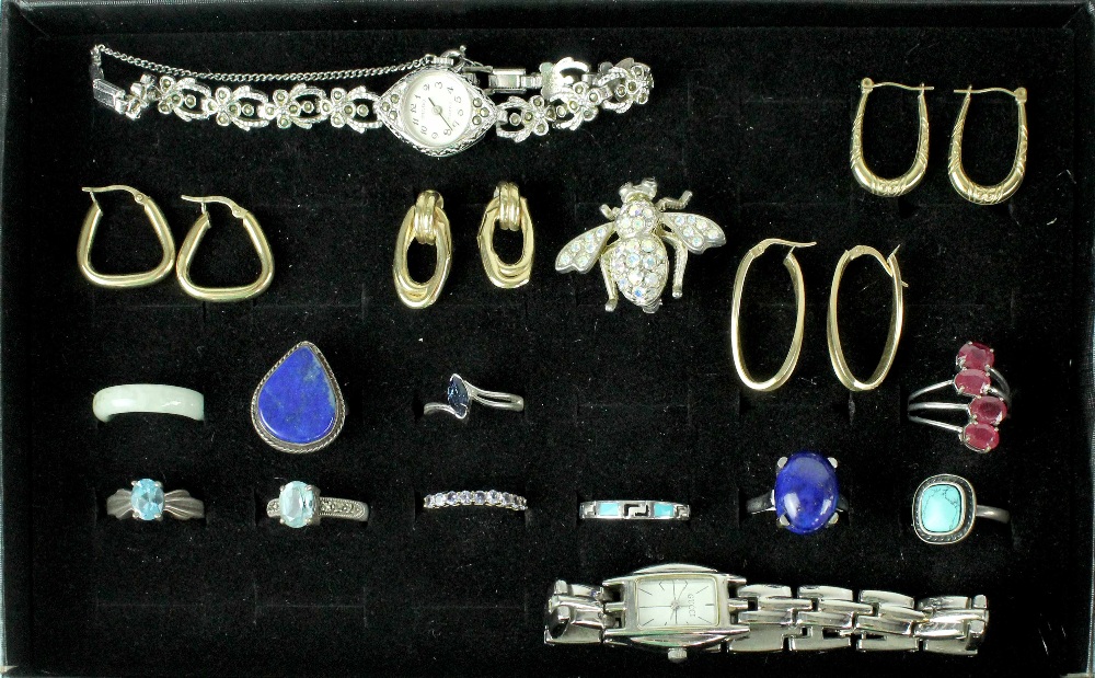 A quantity of costume jewellery to include fashion watches, hardstone rings,