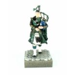 A Border Fine Arts, Scotland, 'The Piper' green, model B2010A,