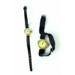 A ladies' 15ct gold watch on black elasticated strap,