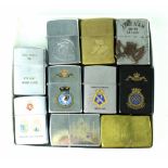 Ten vintage military-themed Zippo and Zippo-style lighters to include Vietnam 68-69 Saigon