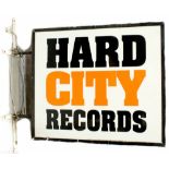 A 'Hard City Records' illuminated advertising sign on a metal wall-hanging bracket, 106.5 x 124.