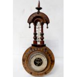 An early 20th century walnut combination wheel barometer and thermometer, length approx 40cm.