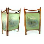 An Edwardian mahogany three-fold fire screen, each panel with hand painted woodland scene,