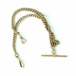 A 9ct gold curb link double Albert watch chain with two swivel clasps and T-bar,