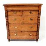 A Victorian pine Scottish chest of four long and two short drawers flanked by half-turned columns