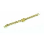 Bueche Girod: a ladies' 1970s 9ct gold bracelet watch,