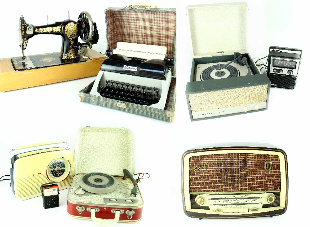 A cased Dansette Viva record player, a similar smaller Alba example, a Jones' sewing machine,