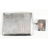 WILMOT MANUFACTURING COMPANY; a George V hallmarked silver cigarette case of rounded rectangular
