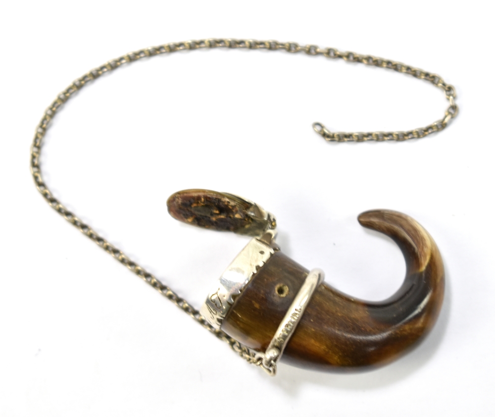 A late 19th/early 20th century Scottish miniature carved horn and white metal mounted snuff mull