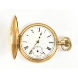 AM. WATCH COMPANY WALTHAM; a 14ct gold plated half hunter pocket watch, the enamelled dial set