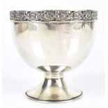 ALBERT EDWARD JONES; a George V hallmarked silver Arts & Crafts pedestal bowl, the pierced and