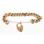 A 9ct yellow gold bracelet with alternate textured and polished bands and with heart shaped
