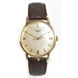 LONGINES; a gentleman's vintage 9ct yellow gold wristwatch with circular dial and replaced strap,