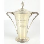 An impressive George VI hallmarked silver Art Deco twin handled trophy cup and cover of