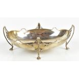 An Edwardian hallmarked silver oval bowl of Art Nouveau design with pierced framework and stepped