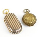 A silver plated and striped decorated full and half sovereign case, length 6.5cm, and a brass